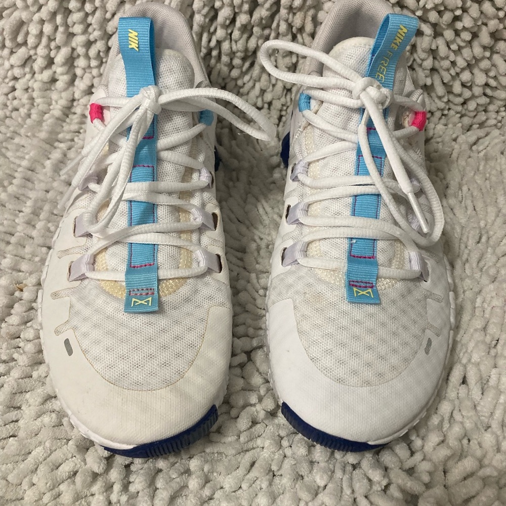 Nike White and Pink Sneakers
For women’s size 9
